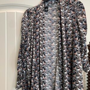 Made in USA 95% polyester, 5% spandex.